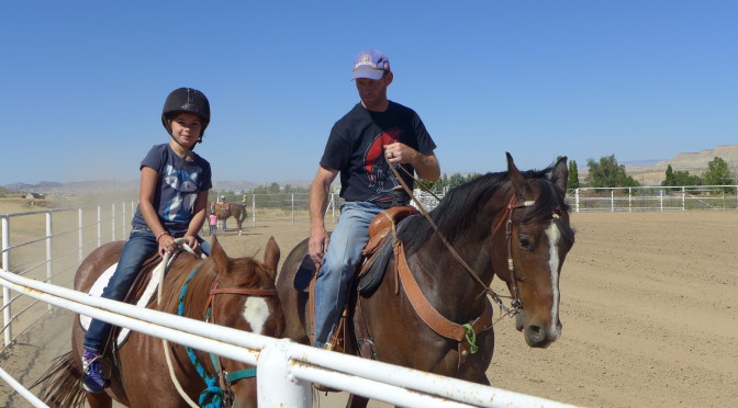 Mackenzie on a horse