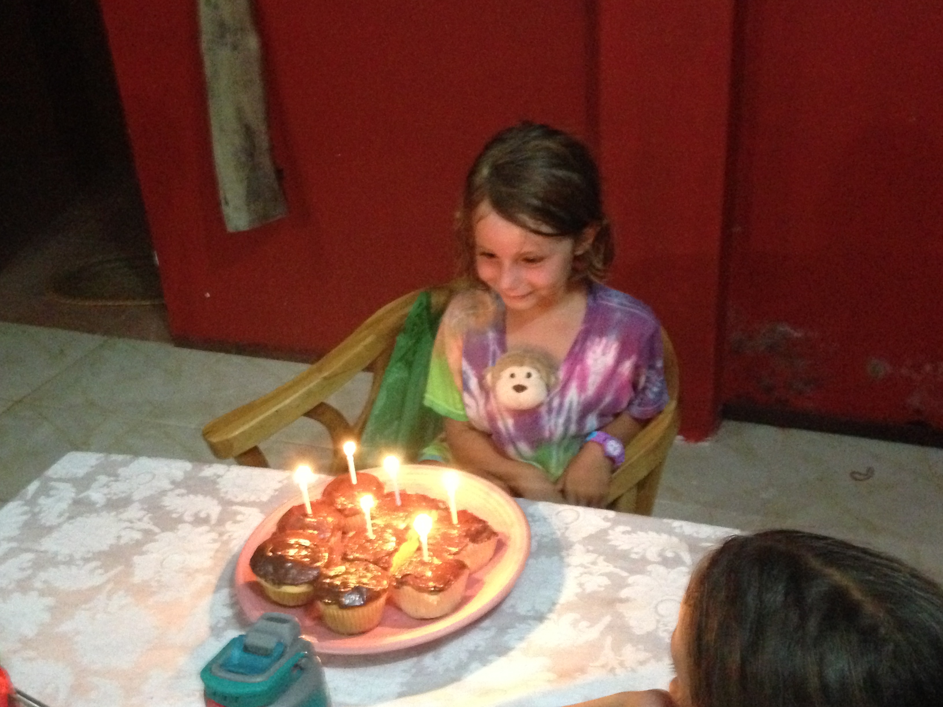 Quinn getting ready to blow out her candles